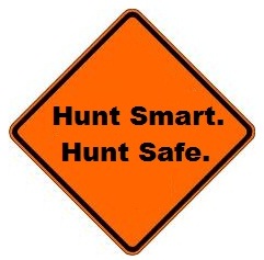 "Hunt Smart. Hunt Safe." orange sign